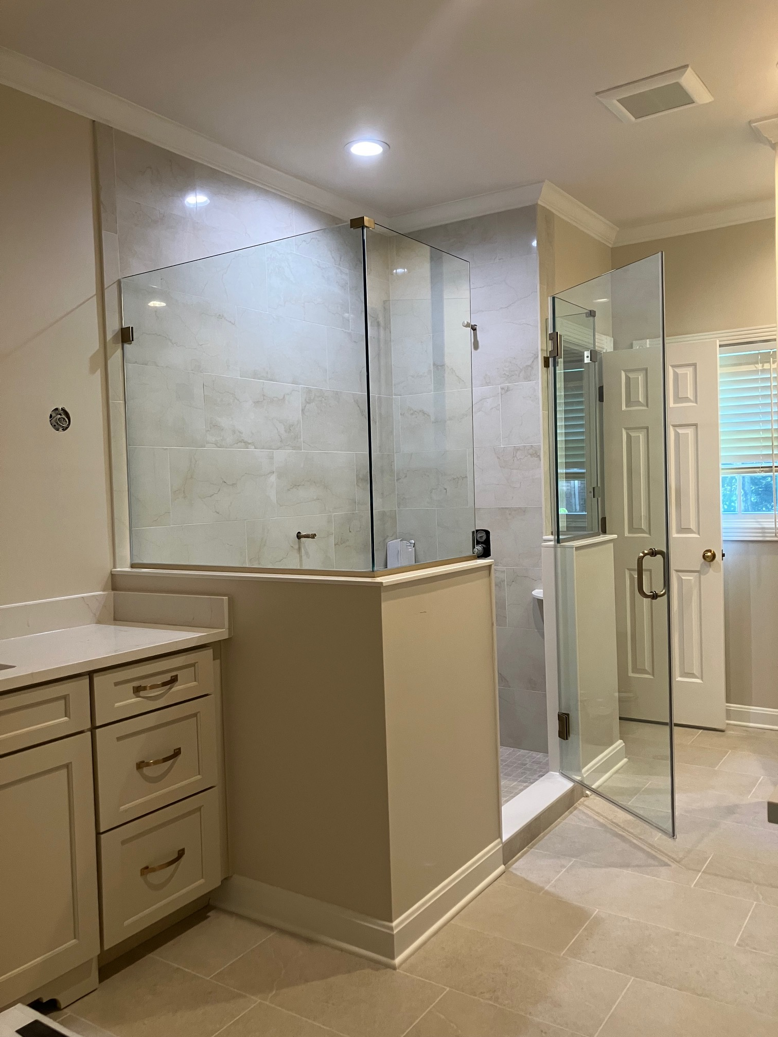 Precision Tile-Cut Frameless Installation in Paris, KY